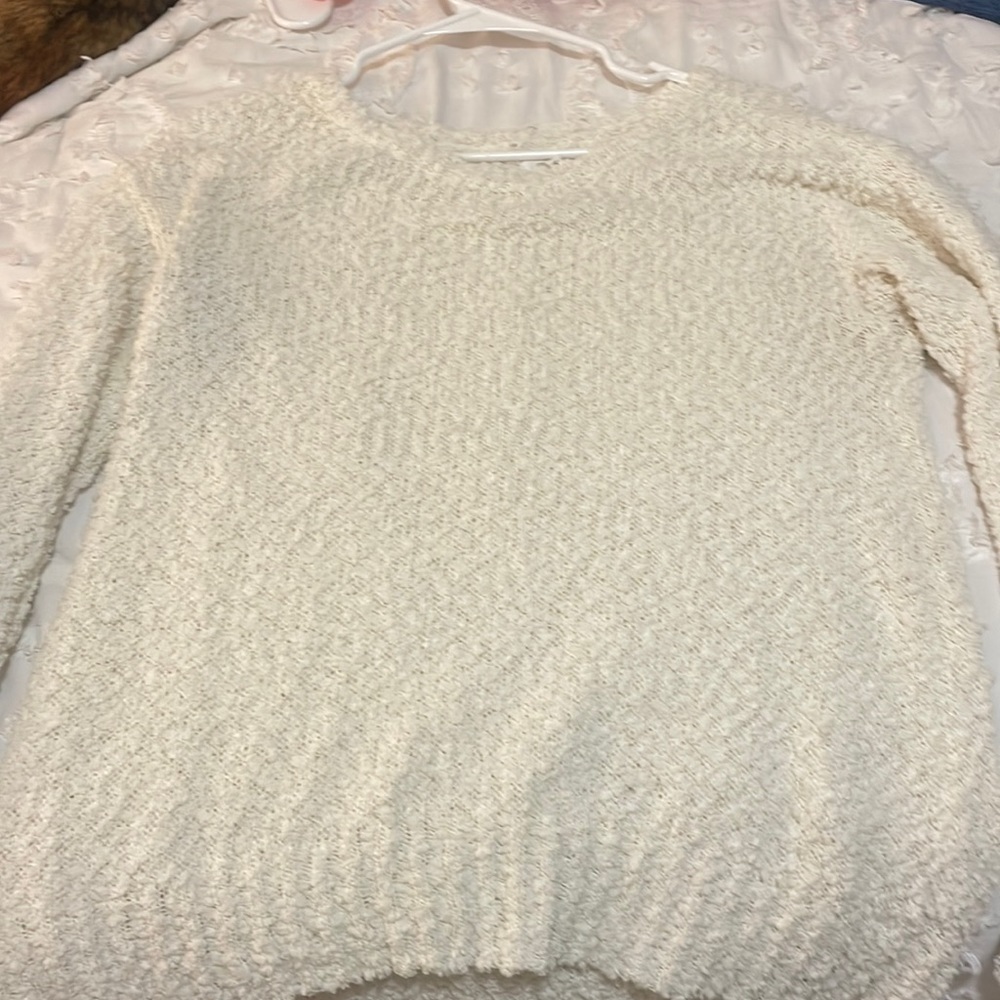 White Maurice’s sweater